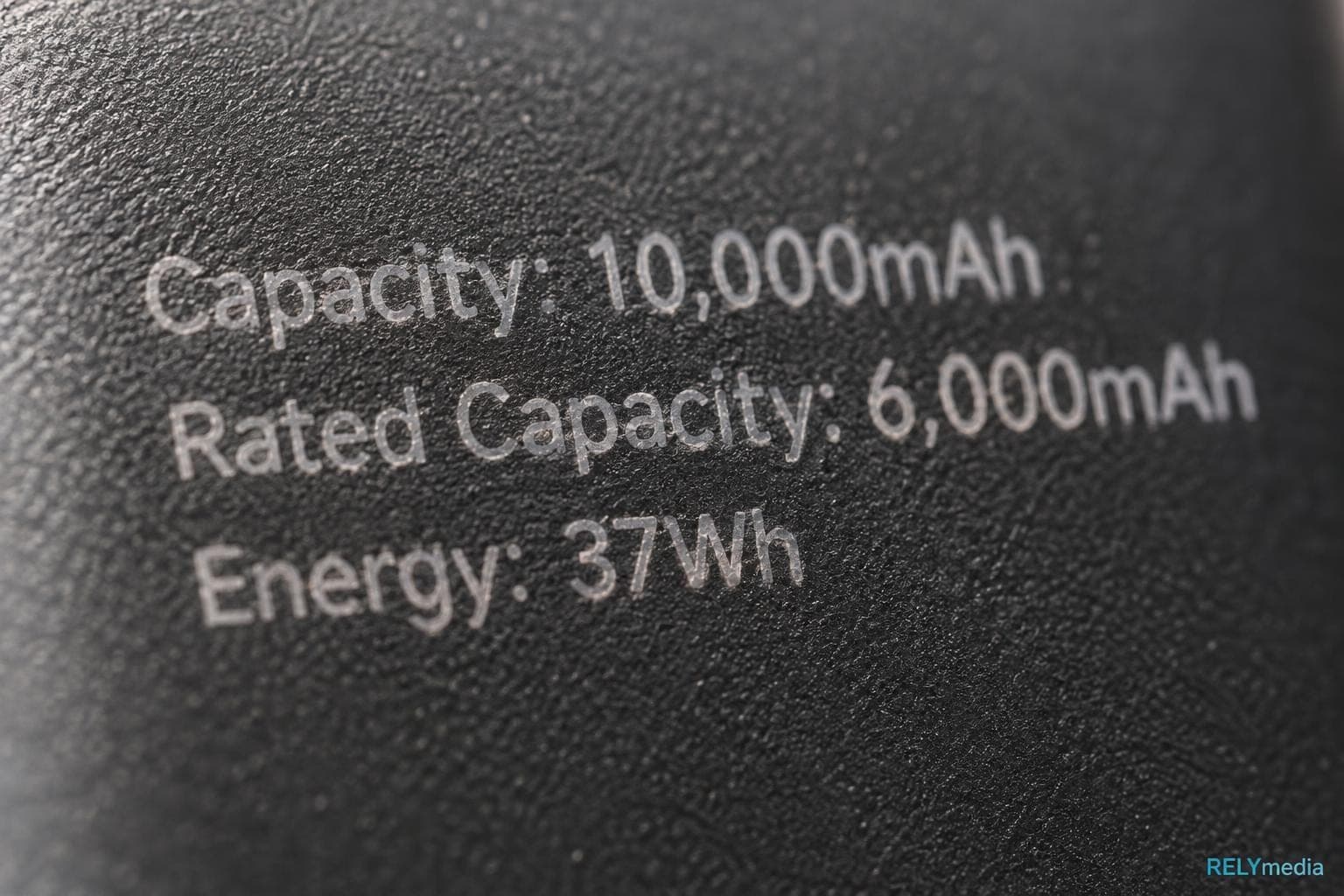 Close-up of the specification label on a power bank
